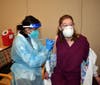 Stephanie Schott, RN, Nurse Manager of the Waveny Care Center, is the 2nd staff member to receive the COVID-19 vaccine. 