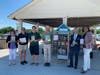 Councilwoman Valerie Cartright, Library Staff & volunteer, and Environmental Educator at the Little Free Library