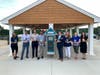 Reinstallation of the Little Free Library for the summer. Nicole Pocchiare, Environmental Educator for the Town of Brookhaven, Council member Jonathan Kornreich, and Emma Clark Library staff.