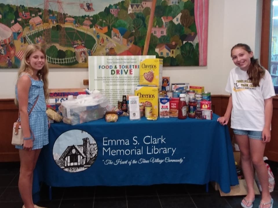 Teen volunteers help with the Library's Food Drive
