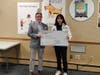 Julia Hou with her big check