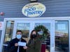 Luis Moposita, Unity Bank Operations Manager, Flemington, (left) presents the $1,800 donation to Jeannine Gorman, Executive Director, Flemington Area Food Pantry.
