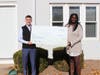 Pictured (from left) during a check presentation are Tyler Simon, Unity Bank Marketing Coordinator; and Angela Fields, Family Promise of Hunterdon County, Executive Director.