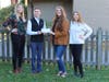 Pictured (from left) are Crystal Rose and Tyler Simon of Unity Bank, and Rachel Opdyke and Isabella Corvelli of Family Promise of Warren County.