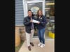 Luis Moposita (left), Unity Bank Area Manager, presents a $1,600 donation to Jeannine Gorman, Flemington Area Food Pantry Executive Director.