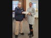 Neil Towey (left), Church of Sacred Heart’s Parish Finance Council Member, receives a $1,600 donation from Kristina Veal, Unity Bank Operations Manager.