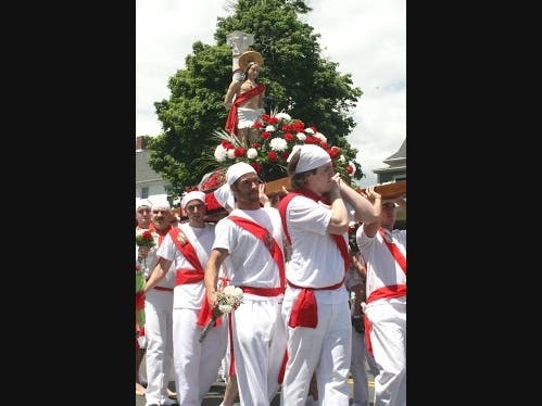 The "I Nuri" Carry The Statue Of Saint Sebastian Outside During The Processional.  This year's Centennial Anniversary Celebration Is Off Due To The COVID-19 Pandemic.  It will be Postponed Until May 2022 According To Church Organizers.