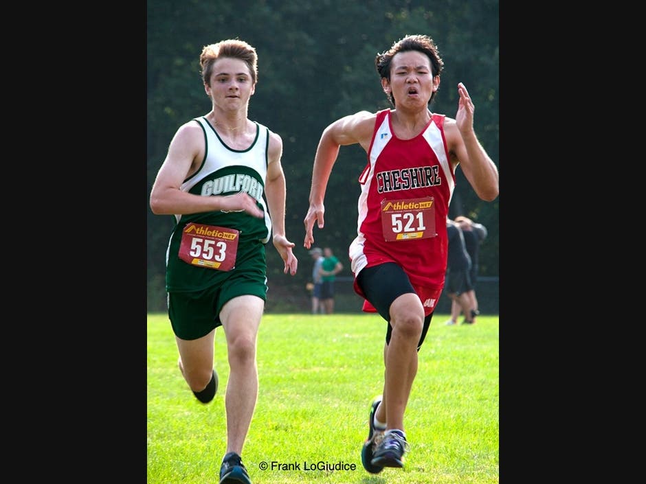 #521 CHS Student-CC Athlete Andrew Xu Runs Ahead Of His Guilford Competitor & Heads For The Finish Line At Middletown's Mercy High School On September 15, 2021. Xu Will Be The Valedictorian For The CHS Class Of 2023.