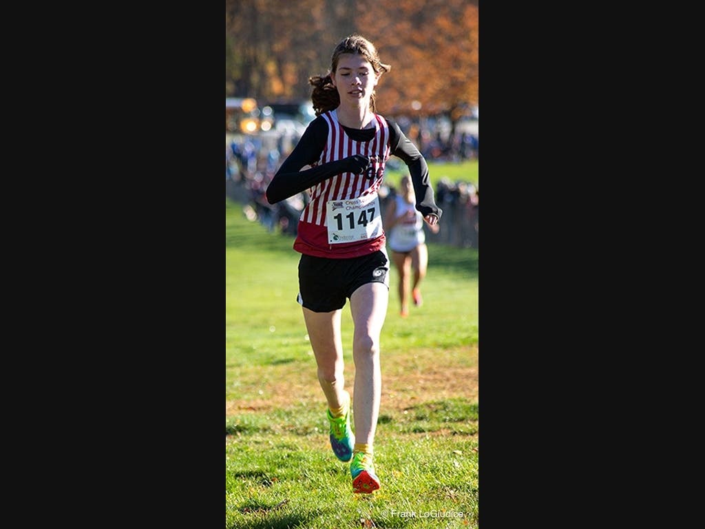 CHS Student-CC Athlete Ava Ciccone Heads Towards The Finish Line At Manchester's Wickham Park For The CIAC Class L Championship On 10-29-22.  At The 9-23-23 Farmington Meet Her Team Finished In 2nd Place. She finished #14.