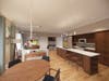 A well-appointed and spacious kitchen is featured at the The Gardens of King-Bruwaert House. 