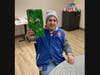 Marty, who receives support from Trinity Services’ Residential Network II, in Wilmington, holds up a gift he received through the Giving Tree Program.