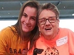 LRHS senior Brooke Roberts (l) with special olympian.