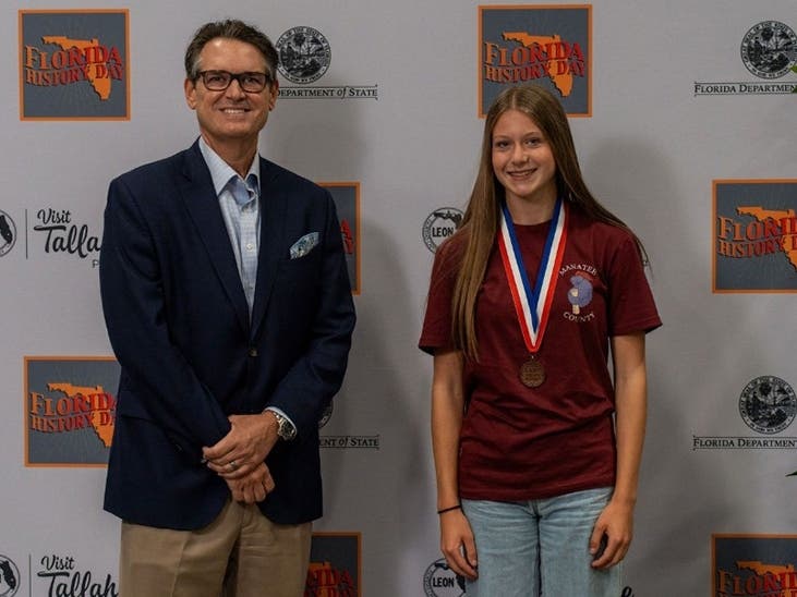 Mackenzie Walker (r) was honored at the Florida History Fair