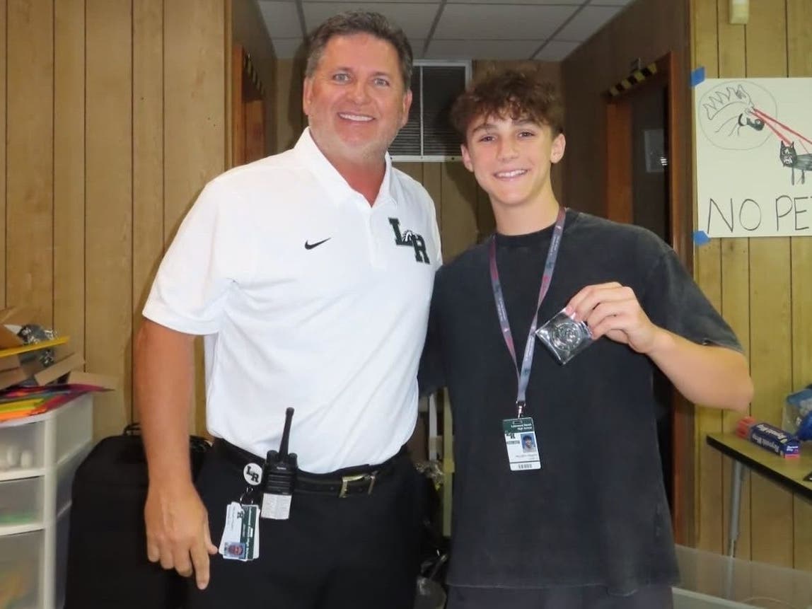 Lakewood Ranch High School Principal Mike Mullen (l) and senior Macklin Higgins