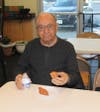 Joe enjoys a zeppole