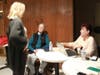 Members sign up for the April 19th auction 