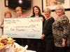Members present the Wakefield Food Pantry with a 2022 donation