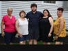 Scholarship winner with family and Lodge officers.