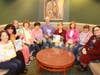 Members display books from Italy