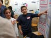 St. Luke's Ally '25 and Matty Shulman '25 (New Canaan residents) explaining their PIE Night project
