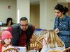 St. Luke's faculty Audio-Visual Specialist Brian DeVissiere and Academic Technologist Sasha Mathrani helped out New Canaan residents and student hackers Eloise Pakman '25 and Ainsley Birmingham '25.