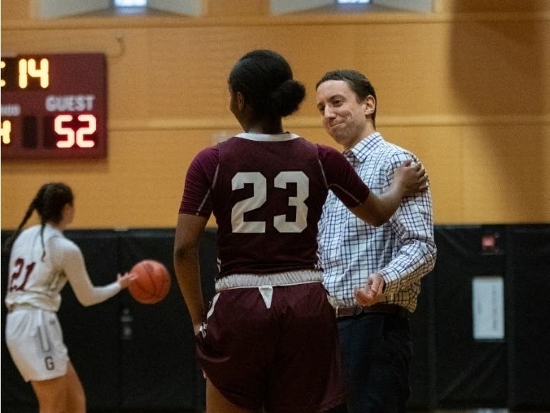 St. Luke's Girls Basketball coach Matt Ward with senior Janelle Johnson