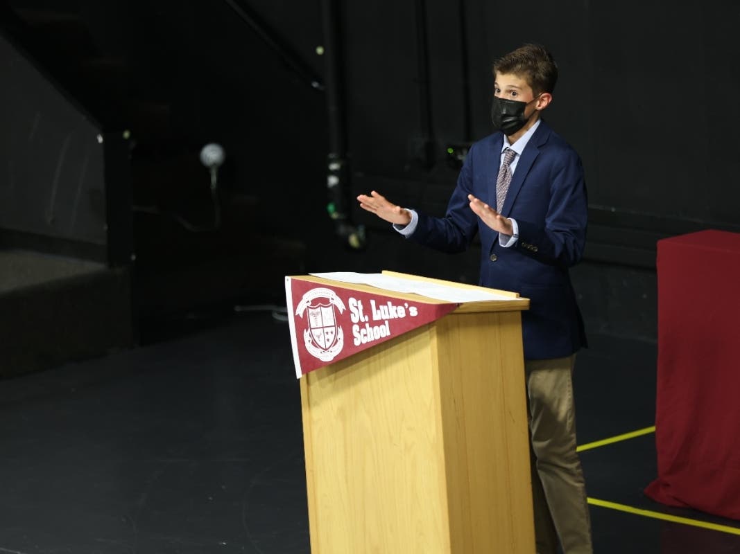 Teddy Broder '25 of New Canaan presents during St. Luke’s School’s annual Eighth Grade Declamations.