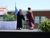 Doron Loewenberg of Stamford receiving his diploma from Head of School Mark Davis of New Canaan.