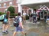 St. Luke’s Head of School Mark Davis, Associate Head of School & Chief Financial Officer Julia Gabriele, and Development Director Jon Jodka greet students on the first day of school.