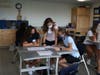 Lena Olbrys '25 (Ridgefield), Kate Hammer ‘25 (Westport), Anna Yavenditti ‘25 (Ridgefield) look at their class schedules during St. Luke’s Upper School orientation.

