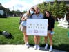 Members of the Mind Matters Club, led by Macy Millones ‘23 of Darien (center), promote their mission at St. Luke’s Club Expo. 