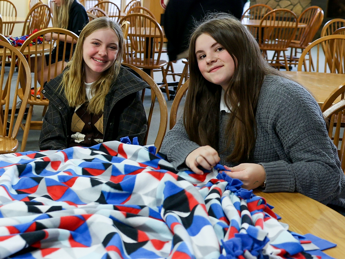 St. Luke's students make blankets for Circle of Care to distribute to children with cancer.