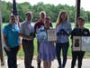 Heritage Conservancy staff members proudly display awards that the organization received thanks to community support