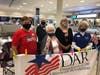 Chapter members Gale Shafer, Lynn Gray, and Marria Blinn, along with Oak Lawn resident Cyndi Rhodes and husbands Steve Blinn and Todd Shafer were at Midway Airport to welcome home the Honor Flight.