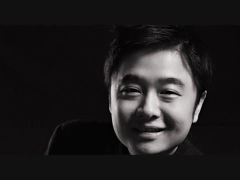 Dr. Jie Yi, Interim Music Director for the Tree of Life Unitarian Universalist Congregation in McHenry.