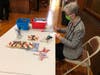Judy Gordon prepares cards for local area veterans.