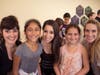 Pictured: Transcendence Artists Natalie Gallo (center) and Lexy Fridell (right) participate with kids from the Boys and Girls Club in a theatre workshop
