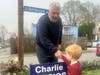 Charlie talks with neighbors and meets a future voter.