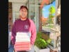 Caption: Perry Anastasakis, owner of Famous Pizza, whose restaurant is one of many local businesses that regularly give back to the community. 