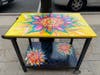 Colorful "Bloom" is sponsored by Gemini Gymnastics Academy and designed by Jenine Clavenger.