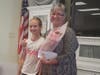 Janet Chiovoloni with her young neighbor.