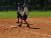 Frank Sirois touches third base and later scores one of three runs tallied by the Kids and Kubs in the sixth inning.