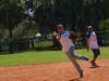 Tampa General infield fires the ball to first base. Kids and Kubs runner Larry McCurdy beat the throw by a gnat's eyelish.
