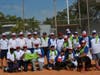 TGH team members pose with Kids and Kubs at conclusion of the game won by TGH 21-15