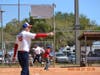 Mayea was captain of his team, shown here directing base runners while a team mate scores from third.