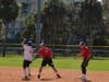 No side rule protects senior runners and fielders. Roy Gardner puts the tag on Bill Barrett while Dominic Vazzano watches the action at second base.