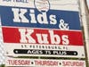 This sign marks the home field of the Kids and Kubs at North Shore Park 901 North Shore Blvd, St Petersburg, FL 33701, The Club office is located at 330 5th Street North. Phone 727-893-7108 info at facebook.co/kidsandkubs. Web page stpetekidsandKubs.com
