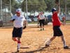Safe! Dennis Kuvalanka crosses first base safely as Sibbi Calendo fields a high throw during action at North Shore Park St Petersburg, FL, Tuesday, November 2.
