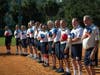 Club members Singing the National Anthem in harmony with the Westminster Palms Vespers Choir members of the 92nd edition of The Three Quarter Century Softball Club during Opening Day ceremonies at North Shore Park in St Petersburg, FL.