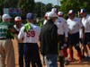 Teams congradulate each opponent on a game